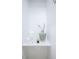 Bathroom storage featuring towels and decorative vase at 1466 Hardin Ave, Atlanta, GA 30337
