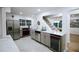 Modern kitchen featuring stainless steel appliances, gray cabinets and marble countertops, great for cooking at 1466 Hardin Ave, Atlanta, GA 30337