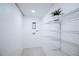 Bright pantry featuring tile floors, white shelving, and space for washer/dryer hookups at 1466 Hardin Ave, Atlanta, GA 30337