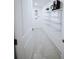 Bright pantry featuring tile floors, white shelving, and space for washer/dryer hookups at 1466 Hardin Ave, Atlanta, GA 30337