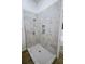The shower boasts elegant marble tiling and modern fixtures, providing a luxurious experience at 1466 Hardin Ave, Atlanta, GA 30337