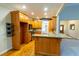 Updated kitchen featuring granite countertops, wood cabinets, and stainless steel appliances at 403 Pebblebrooke Ln, Canton, GA 30115