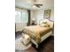 Charming bedroom with window, neutral decor, and hardwood floors at 102 Cedar Chase Rd, Atlanta, GA 30324