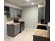 Kitchen with gray cabinets and butcher block counters at 102 Cedar Chase Rd, Atlanta, GA 30324