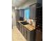 Kitchen with gray cabinets and butcher block countertops at 102 Cedar Chase Rd, Atlanta, GA 30324