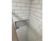 Modern shower with white subway tile and mosaic tile niche at 102 Cedar Chase Rd, Atlanta, GA 30324