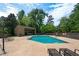 Community pool with lounge chairs and a pool house at 102 Cedar Chase Rd, Atlanta, GA 30324