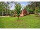 Brick house exterior with green lawn at 4593 Dogwood Rd, Pine Lake, GA 30072