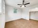 Bedroom featuring neutral walls, tile floors, and a large closet at 741 Prince Ave, Marietta, GA 30062