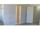 Neutral room with closet and carpet at 6258 Crooked Creek Dr, Rex, GA 30273