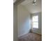 Neutral bedroom with ceiling fan and carpet at 6258 Crooked Creek Dr, Rex, GA 30273