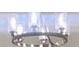 Elegant chandelier with a modern design at 6258 Crooked Creek Dr, Rex, GA 30273