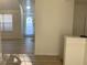 Inviting entryway with new floors and natural light coming through large windows at 6258 Crooked Creek Dr, Rex, GA 30273