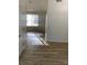 Welcoming living area with natural light and seamless flow into other living spaces at 6258 Crooked Creek Dr, Rex, GA 30273