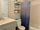 Bathroom with shower/tub combo, vanity and decorative accents at 4132 Scenic Mountain Dr, Snellville, GA 30039