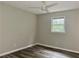 Spacious bedroom with ceiling fan and large window at 4132 Scenic Mountain Dr, Snellville, GA 30039