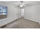 Cozy bedroom with a ceiling fan, natural lighting, and a double door closet at 1575 Ridenour Nw Pkwy # 804, Kennesaw, GA 30152