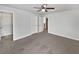 Bright main bedroom with a ceiling fan, large closet, and neutral carpet at 1575 Ridenour Nw Pkwy # 804, Kennesaw, GA 30152
