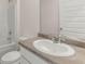 Bathroom with a white sink, vanity, toilet, and shower-tub combination at 8588 Preakness Pass, Lithonia, GA 30058