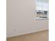 This sun-drenched bedroom is carpeted and the walls are painted neutral at 8588 Preakness Pass, Lithonia, GA 30058