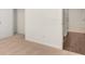 This bedroom features neutral carpet, a walk-in closet, and an en-suite bathroom at 8588 Preakness Pass, Lithonia, GA 30058