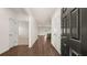 Inviting foyer with sleek hardwood floors and contemporary design at 8588 Preakness Pass, Lithonia, GA 30058