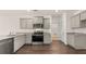 Stylish kitchen featuring stainless steel appliances and neutral-toned cabinetry at 8588 Preakness Pass, Lithonia, GA 30058