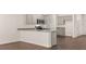 Gourmet kitchen with granite counters, stainless appliances, and open layout at 8588 Preakness Pass, Lithonia, GA 30058