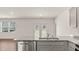 Kitchen featuring stainless steel appliances, granite countertops, and an open layout at 8588 Preakness Pass, Lithonia, GA 30058