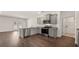 Modern kitchen with stainless steel appliances and granite countertops at 8588 Preakness Pass, Lithonia, GA 30058