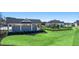 Playground and pavilion area for residents, with slides and lush green grass at 8588 Preakness Pass, Lithonia, GA 30058