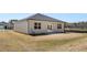 A single Gathering home with a sodded backyard, double doors and horizontal siding at 8588 Preakness Pass, Lithonia, GA 30058