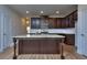 Open kitchen design with large island, granite countertops, and modern stainless steel appliances at 6198 Ripple Way # 87, South Fulton, GA 30349