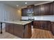 Well-designed kitchen with a spacious island and modern stainless steel appliances at 6198 Ripple Way # 87, South Fulton, GA 30349