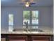 Well-lit kitchen with a large island, modern appliances, and ample natural light at 6198 Ripple Way # 87, South Fulton, GA 30349