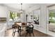 Cozy breakfast nook with a table and chairs, surrounded by windows for natural light at 4055 Vinings Mill Se Trl, Smyrna, GA 30080