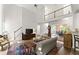 Open concept living room with soaring ceilings and a view of the upstairs landing at 4055 Vinings Mill Se Trl, Smyrna, GA 30080