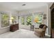 Cozy sitting area with natural light from large windows, ideal for reading or relaxing at 4055 Vinings Mill Se Trl, Smyrna, GA 30080