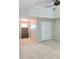 Bedroom showcasing ample space, a tray ceiling with a fan, and a closet, providing comfort and practicality at 52 Olivia Ct, Palmetto, GA 30268