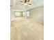 Spacious bedroom featuring tray ceiling and large windows at 52 Olivia Ct, Palmetto, GA 30268