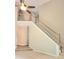 Open staircase with white railings and carpeted stairs at 52 Olivia Ct, Palmetto, GA 30268