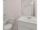 Clean bathroom with white vanity, toilet, and bathtub at 4084 Spencer Trl, Stonecrest, GA 30038