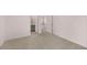 Well-lit bedroom with carpet and access to other rooms at 4084 Spencer Trl, Stonecrest, GA 30038