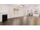 Open living room with fireplace and hardwood floors at 4084 Spencer Trl, Stonecrest, GA 30038