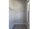Walk-in closet featuring carpet floors, window, and wire shelving at 6202 Ripple Way # 88, South Fulton, GA 30349