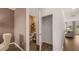 This property features a convenient half bath with a wood floor and built-in shelving at 126 Oakchase Park Ln, Hampton, GA 30228