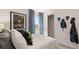 Cozy bedroom with natural light, patterned curtains, and unique wall decor accents at 126 Oakchase Park Ln, Hampton, GA 30228