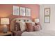 Charming bedroom with plush bedding, stylish artwork, and soft, inviting lighting at 126 Oakchase Park Ln, Hampton, GA 30228