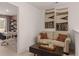 Comfortable sitting area with a cozy couch and desk, perfect for relaxation and productivity at 126 Oakchase Park Ln, Hampton, GA 30228