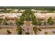 Aerial view of a shopping center with ample parking and various retail stores at 480 Broom Dr, Cumming, GA 30040